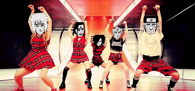 a group of people wearing masks and plaid dresses are dancing together