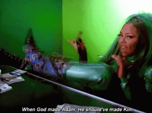a woman in a green veil says " when god made adam he should ve made kim "