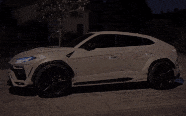 a white car has ago ne vida written on the side