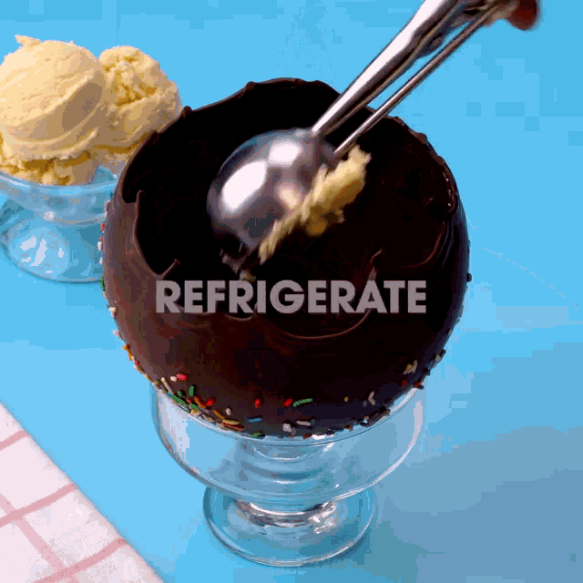 a scoop of ice cream is being scooped out of a chocolate bowl that says refrigerate on it