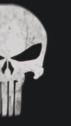 a punisher skull with a knife in it 's mouth