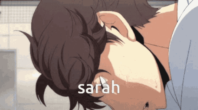 a close up of a person 's face with the name sarah written above it
