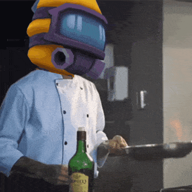 a chef with a helmet on his head is holding a bottle of komeco wine