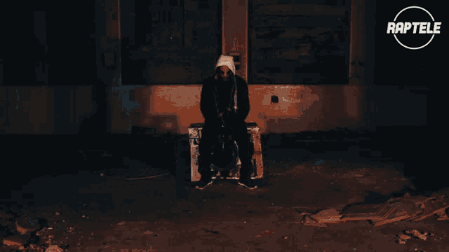 a man wearing a mask with the word raptele on the bottom right