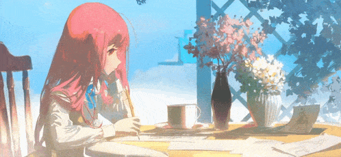 a girl with pink hair is sitting at a table with a cup of coffee and a vase of flowers