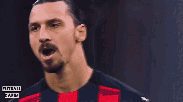 a close up of a man 's face with the words " futbol karim " on the bottom
