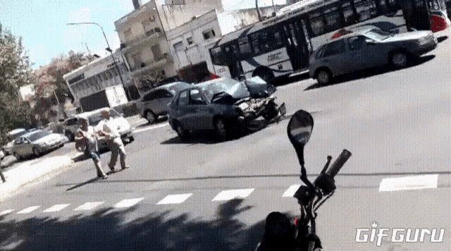 a gif of a car accident with the words gif guru on the bottom right