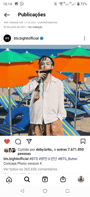 a picture of a person eating a watermelon on a beach