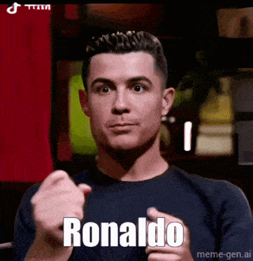 a man in a black shirt is giving a thumbs up and the word ronaldo is on the screen