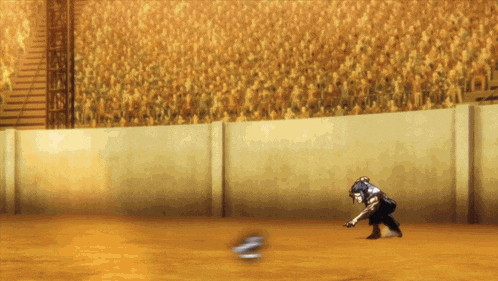 a baseball player catches a ball in front of a large crowd