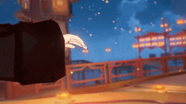 a person 's hand is reaching out towards something in a video game