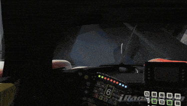 the inside of a race car with the numbers 6 and 21 on the dashboard