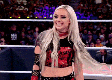 a woman in a wrestling ring with a shirt that says csc event eve