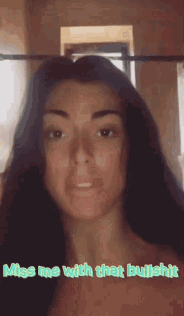 a woman with long dark hair says miss me with that bullshit