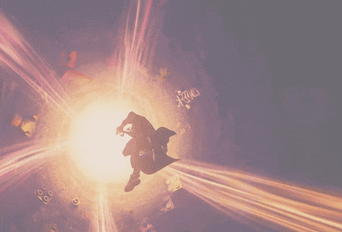a person is flying through the air with a light behind them that says ' a ' on it