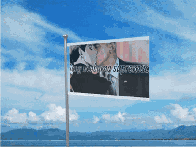 a flag with a picture of obama kissing another man and the words sangwoosama suprememac