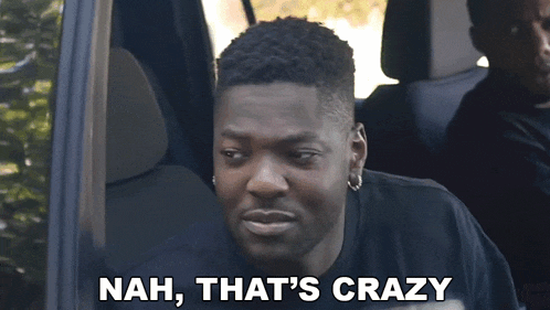 a man in a car with the words nah that 's crazy on the bottom