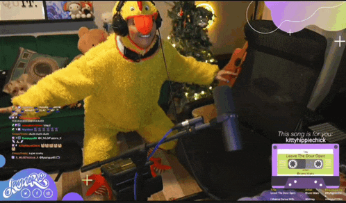 a man in a chicken costume is singing a song