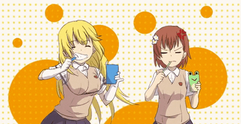 a girl brushing her teeth while another girl holds a frog