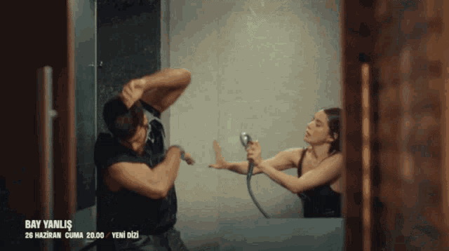 a man and a woman in a bathtub with bay yanlis written on the bottom of the screen