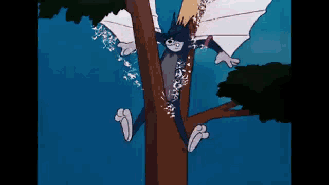 a cartoon cat is hanging from a tree branch with a bat 's wings .