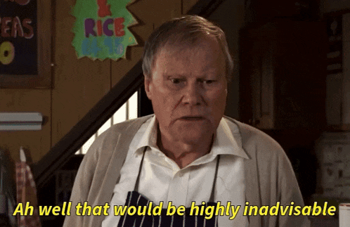 an older man is standing in front of a sign that says rice