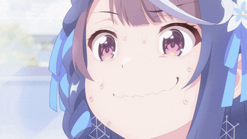 a close up of a girl 's face with sweat coming out of her mouth