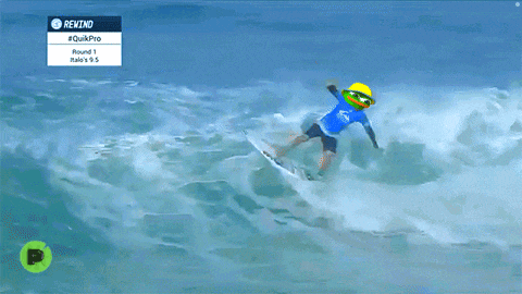 a person riding a surfboard in the air with the word rekind on the screen
