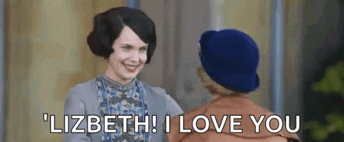 two women are standing next to each other and one of them is saying " lizbeth ! i love you "
