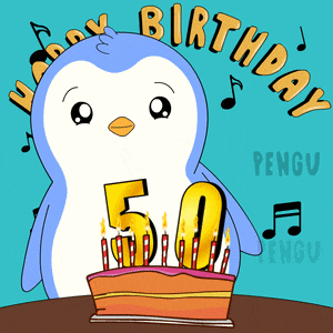a penguin is blowing out candles on a birthday cake with the number 50 on it