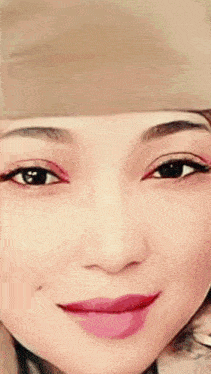 a close up of a woman 's face with the numbers m5759 on top
