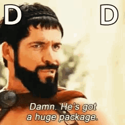 a man with a beard is holding a sword and saying `` damn he 's got a huge package . ''