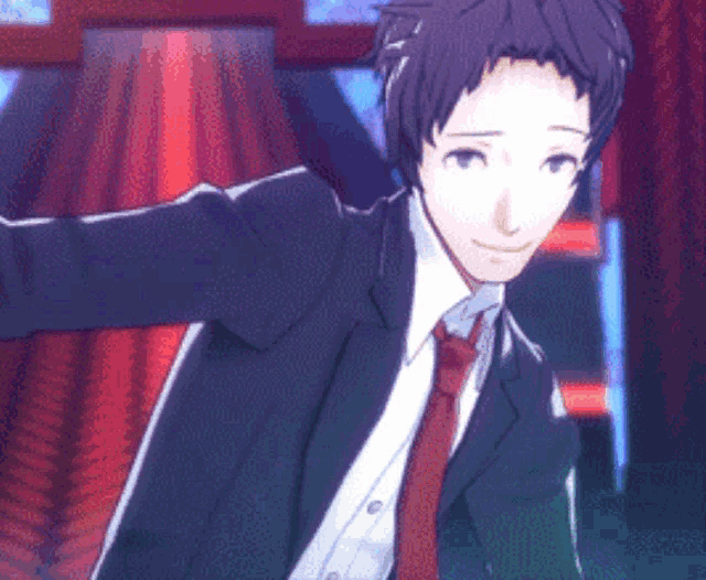 a man in a suit and tie is standing in a room