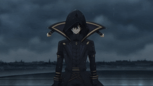 a person wearing a pair of black boots with a gold stripe