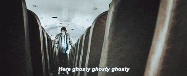 a man walking down a staircase with the words here ghosty ghosty ghosty written on the bottom