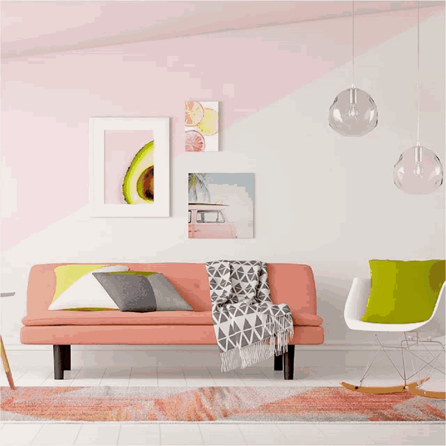 a living room with a pink couch and a white rocking chair