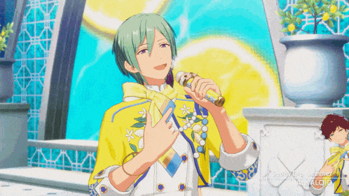 a man with green hair is singing into a microphone in front of a sign that says sunny day summer