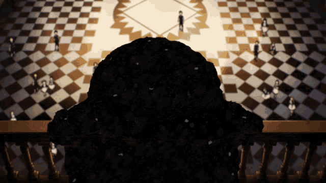 a person standing in front of a checkered floor
