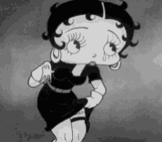 a black and white cartoon of betty boop in a black dress is dancing .