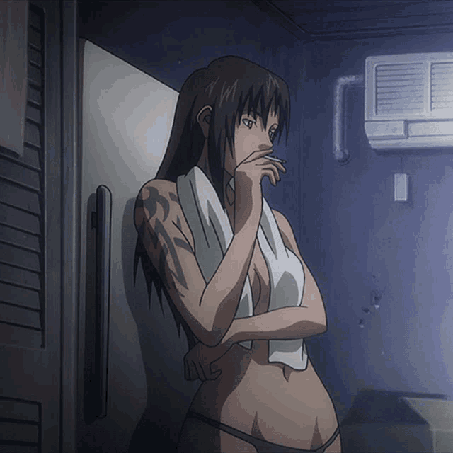 a naked woman with a tattoo on her arm smoking a cigarette