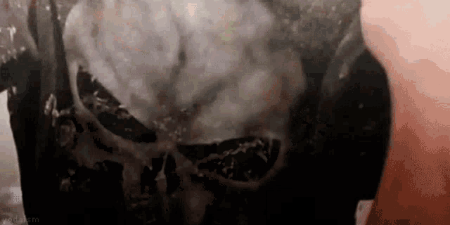 a close up of a punisher skull on a black background