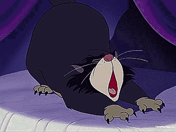 a cartoon cat with its mouth open is laying on its back