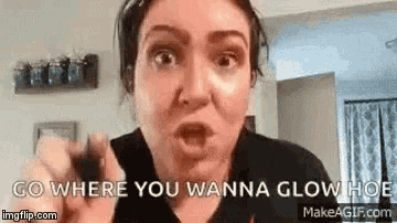 a woman is making a funny face and saying `` go where you wanna glow hoe ''
