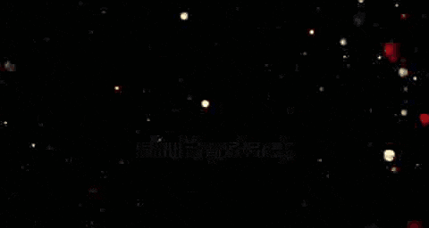 a happy birthday sign that is glowing in the dark