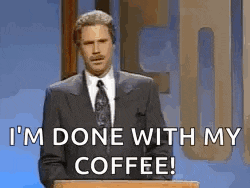 a man in a suit and tie is standing at a podium saying `` i 'm done with my coffee ! ''