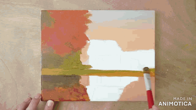 a painting is being painted on a canvas with the words made in animatica written on the bottom