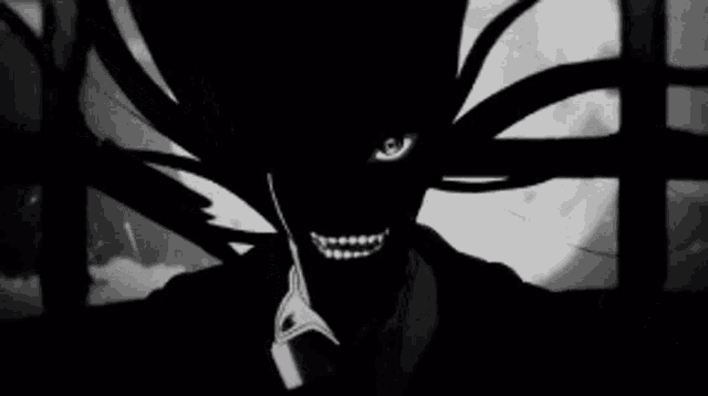 a black and white drawing of a monster with its mouth wide open .