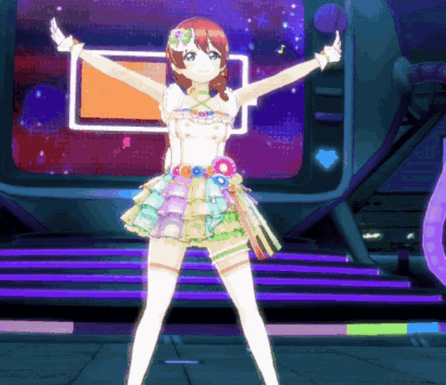 a girl in a colorful dress is dancing in front of a screen