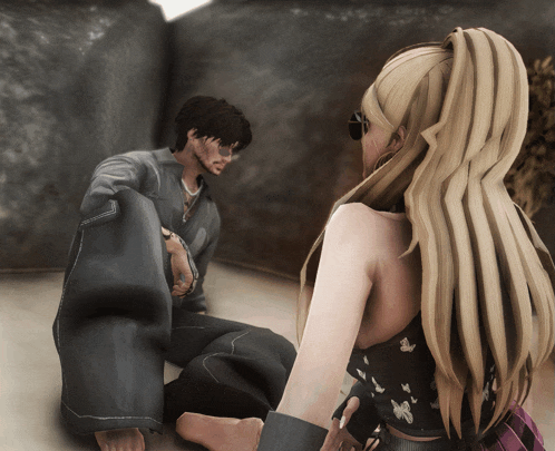 a man and a woman are sitting on the ground in a room