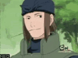 a man with long hair is wearing a blue hat and a green vest .